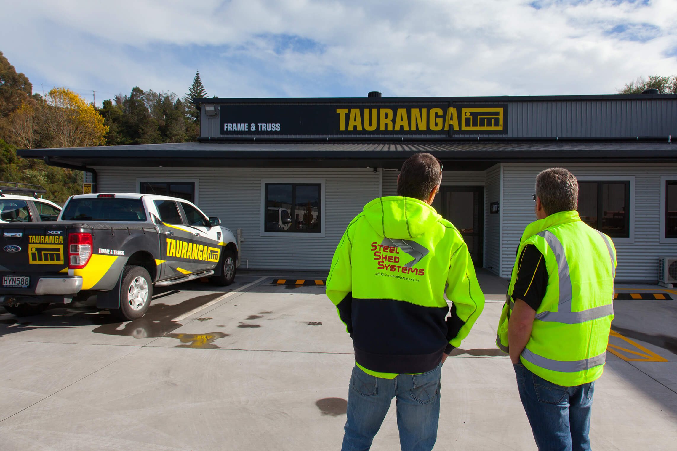 wide span sheds nz, steel building shop front